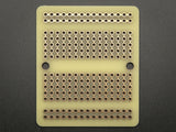 Adafruit Perma-Proto Quarter-sized Breadboard PCB - Single